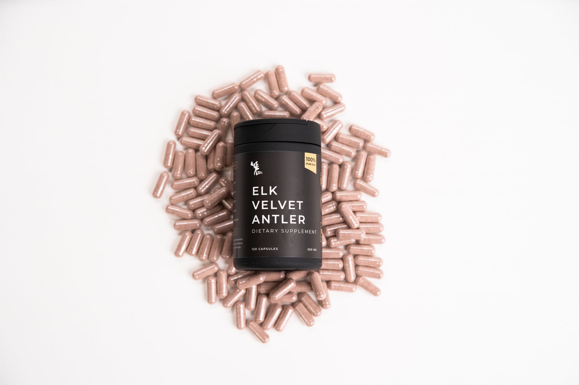 Container of Elk Velvet Antler supplements surrounded by capsules on a white background