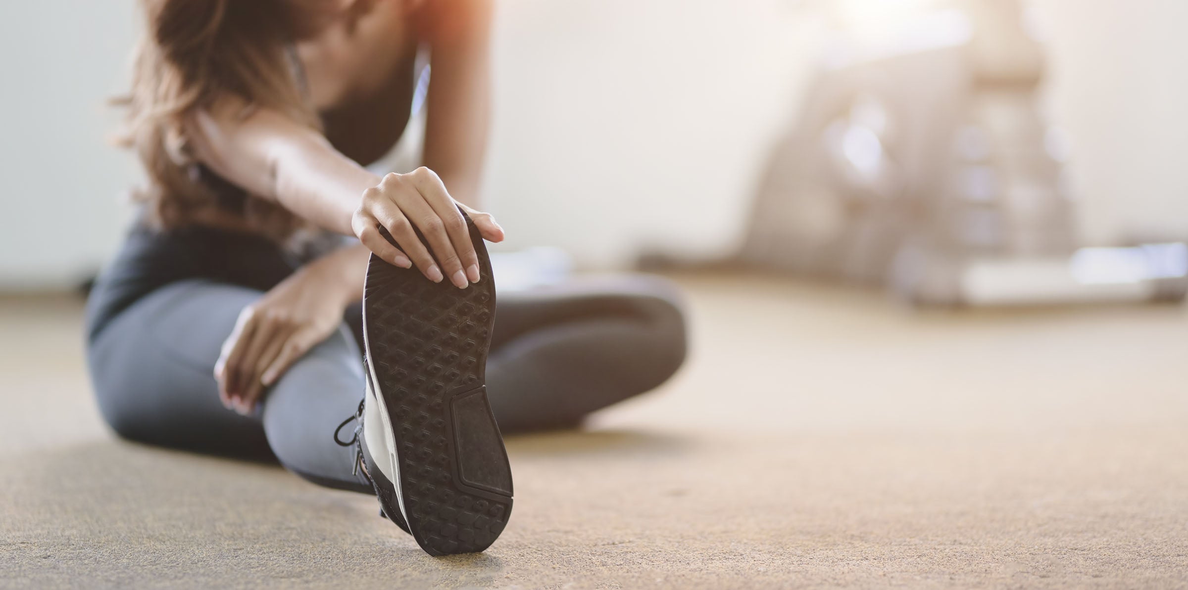 woman stretching before working out